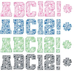Pode incluir: Um conjunto de letras, n&uacute;meros e s&iacute;mbolos decorativos com um padr&atilde;o floral. O conjunto inclui as letras A, B e C, os n&uacute;meros 1 e 2, um ponto de exclama&ccedil;&atilde;o e um asterisco. Os desenhos s&atilde;o em rosa, azul, verde e preto.