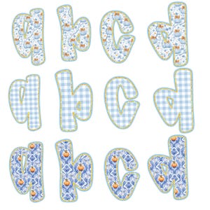 May include: A collection of lowercase letters a, b, c, and d in various patterns. Some letters feature a blue and white gingham pattern, while others display a floral design with pumpkins. Each letter has a gold border.