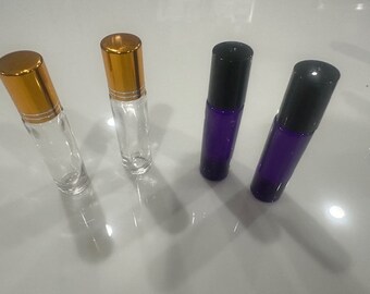 Essential Oil and Serum bottle with roller ball  clear and purple with gold and black cap