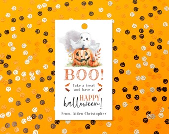 May include: A white tag with a ghost and a pumpkin illustration. The text on the tag reads "BOO! Take a treat and have a happy halloween! From, Aiden Christopher."