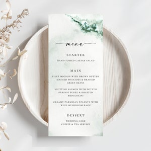 May include: A wedding menu card with a watercolour background in shades of green and brown. The menu includes starter, main, and dessert options. The text reads: "menu", "Starter", "Hand-tossed Caesar Salad", "Main", "Filet Mignon with Brown Butter", "Mashed Potatoes & Braised Green Beans", "Scottish Salmon with Potato Parsnip Puree & Roasted Broccolini", "Creamy Parmesan Polenta with Wild Mushroom Ragu", "Dessert", "Wedding Cake", "Coffee & Tea Service."