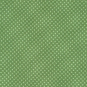 Könnte beinhalten: Ein grüner Stoff mit weißen Punkten.