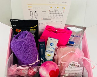 May include: A pink and white gift box filled with various items, including a purple fuzzy towel, a pink heart-shaped stress ball, a pink bath bomb, a pink and white bath pouf, a pink and white cooling patch, a pink and white liquid IV hydration multiplier packet, a pink and white jelly bean bag, and a pink and white bag with a white ribbon. The box also includes a white sheet of paper with a checklist and a calendar.