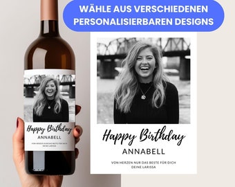 May include: A black and white photo of a woman smiling is on a white wine bottle label. The label has the text "Happy Birthday Annabell" and "Von Herzen nur das Beste für dich Deine Larissa".
