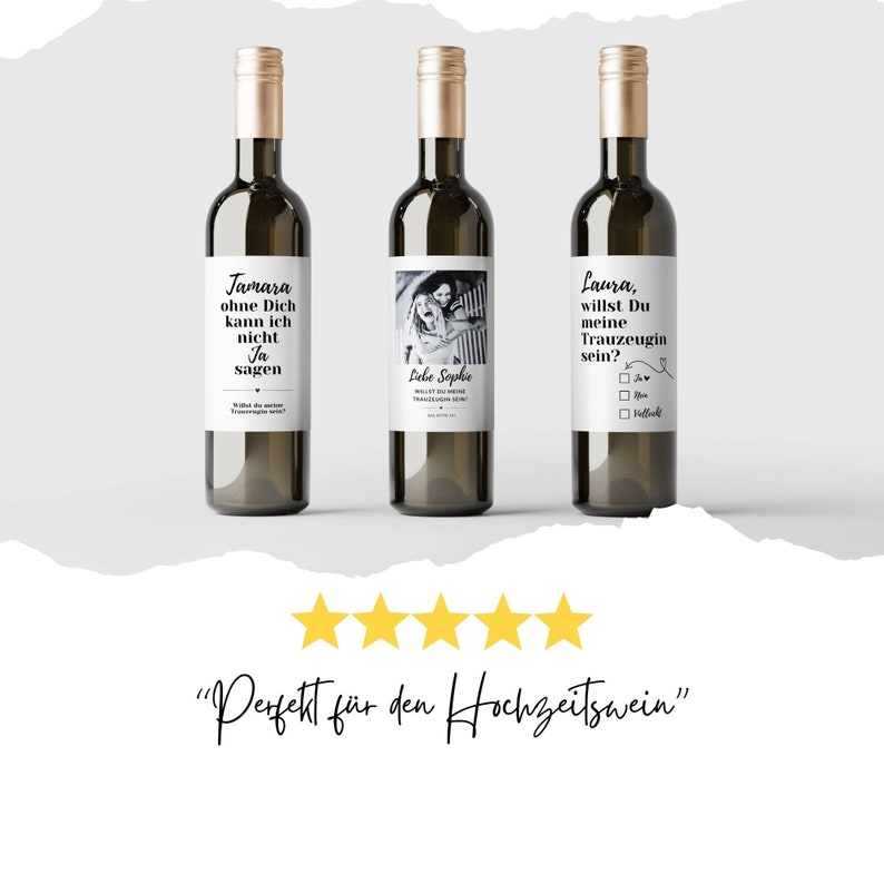 May include: Three wine bottles with personalized labels. The labels feature text in German and a black and white photo of two women. The text on the labels reads "Jamara ohne Dich kann ich nicht Ja sagen", "Liebe Sophie" and "Laura, willst Du meine Trauzeugin sein?"