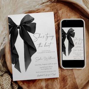 May include: A black and white wedding invitation with a black bow on the top. The invitation reads "She's tying the knot" and includes the bride's name, date, time, and location. The invitation also includes the text "RSVP to Jennifer at 123-456-7890" and "Registered at Amazon & Target".