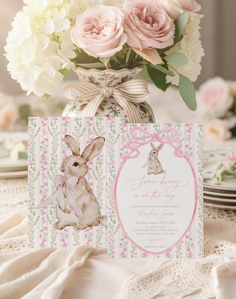 May include: Two baby shower invitations with a bunny theme. The invitations feature a watercolor illustration of a bunny with a pink bow. The text "Some bunny is on the way" is written in pink script.