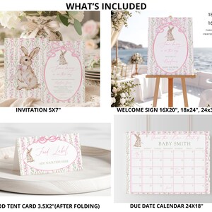 May include: A collection of baby shower stationery featuring a bunny theme. Includes invitations, a welcome sign, food tent cards, and a due date calendar. The designs are in soft pink and white with floral accents and the text "What's Included".