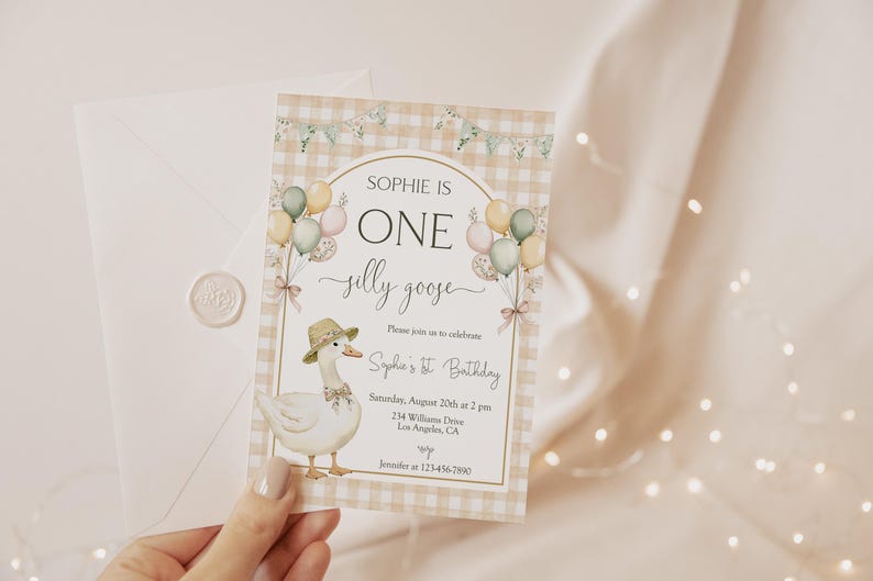 May include: A light brown and white checkered invitation with a cute cartoon goose wearing a hat and holding balloons. The text reads "Sophie is One silly goose" and includes details for a first birthday party.