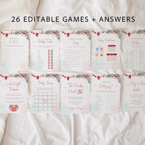 May include: A set of 26 editable baby shower game cards with festive holiday designs. Each card features a unique game, such as "Baby Bingo" and "Baby Predictions," with decorative borders and the text "26 EDITABLE GAMES + ANSWERS."