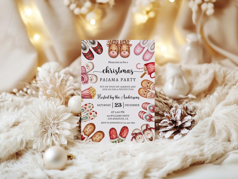May include: A Christmas pyjama party invitation with a white background and colourful illustrations of pyjamas, popcorn, candy canes, and a reindeer. The text reads "Please join us for a Christmas Pyjama Party. Put on your fav jammies and join us for a festive fun! Hosted by the Andersons. Saturday 23 December at 2:00 PM. 234 Williams Drive, Los Angeles, CA. RSVP to Jennifer at 416-990."