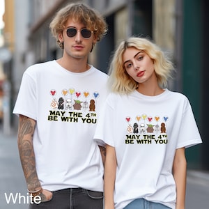a couple of people standing next to each other