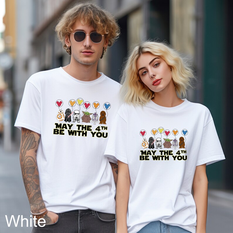 a couple of people standing next to each other