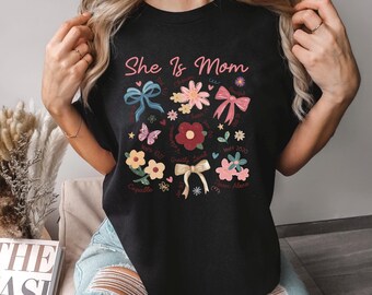 She Is Mom Shirt, Comfort Colors, Religious Mom Bible Verse Shirt, Floral Coquette Mom Tee,Mother's Day Shirt, Blessed Mom Gift Shirt 155556