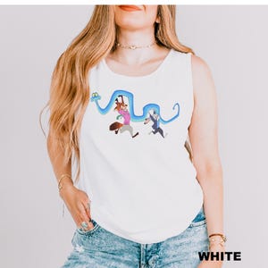 A woman wearing a white tank top with a cartoon character design on it.