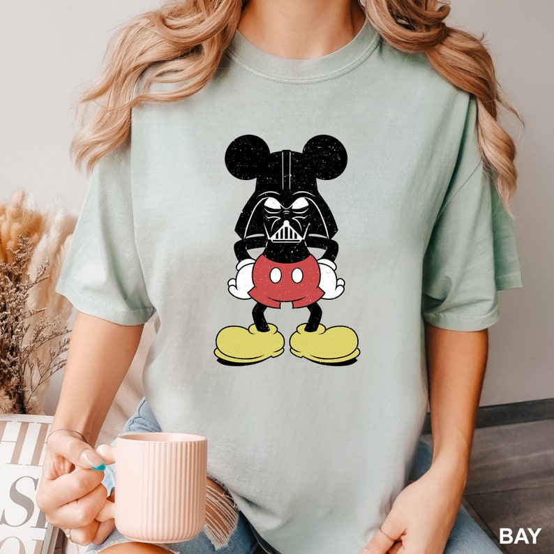 a woman is holding a coffee cup and wearing a mickey mouse t - shirt Disney Mickey Darth Wader Shirt, Comfort Colors Disney Shirt, Star Wars Family Shirt, Disney Star Wars Shirt, Disney Trip Shirt