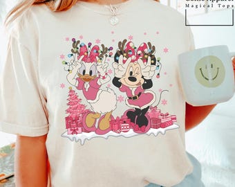 Disney Minnie And Daisy Pink Christmas Shirt, Comfort Colors Disney Shirt, Disney Family Christmas Shirt, Disney Pink Christmas Shirt 151909