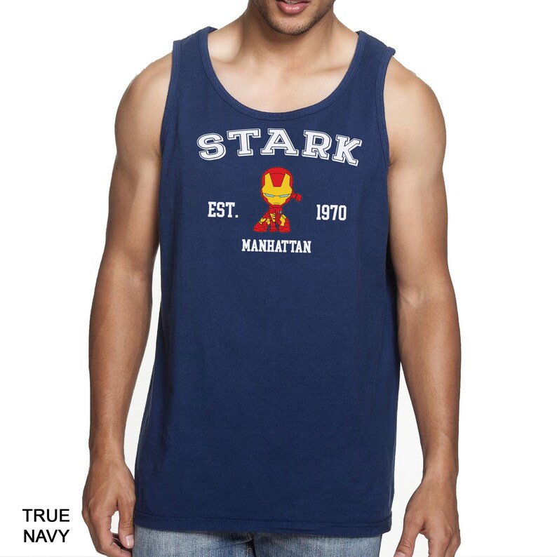 A man wearing a navy blue tank top with a graphic of a character from the Marvel Cinematic Universe.