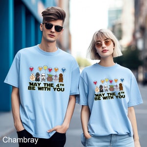 a couple of people standing next to each other