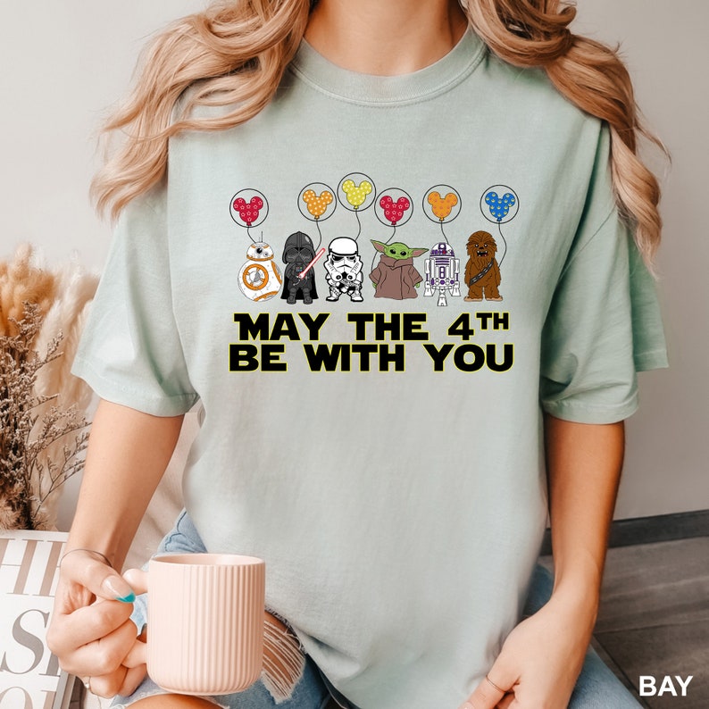 a woman wearing a star wars shirt holding a coffee mug Star Wars Characters May The 4th Be With You Shirt, Comfort Colors Shirt, Star Wars Day Shirt, Disney Star Wars Shirt