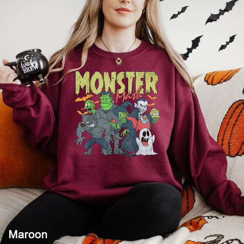 a woman sitting on a couch holding a remote control