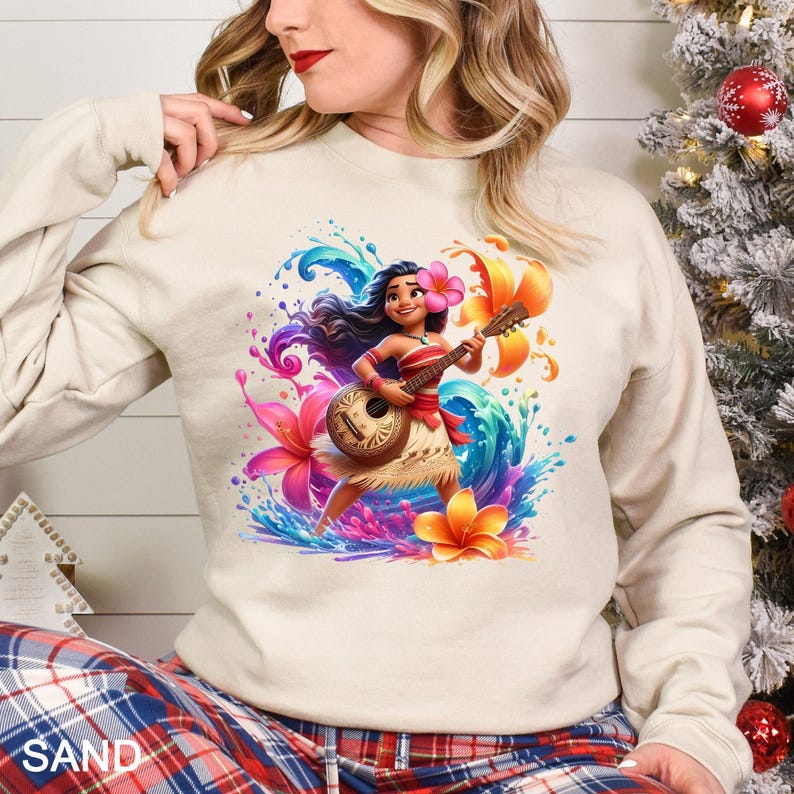a woman wearing a sweatshirt with a hawaiian hula girl on it