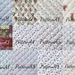 May include: A collection of quilted fabric swatches with various floral and patterned designs. The swatches include patterns with small flowers, teddy bears, and patchwork. Each swatch is labeled with a pattern name, such as "Pattern Y" and "Pattern A10".