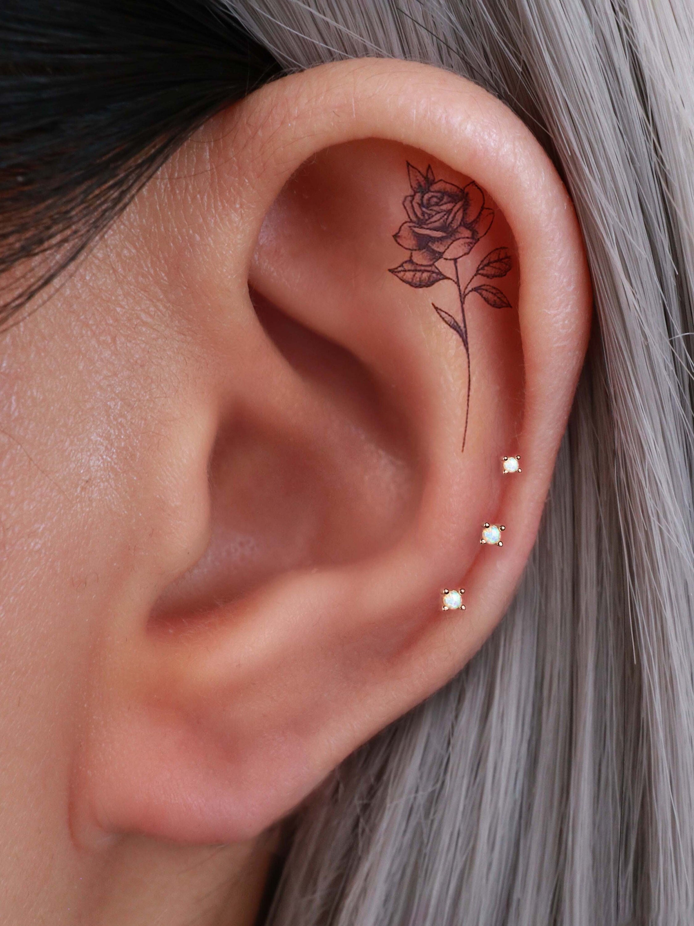 Triple forward helix piercing outlet
