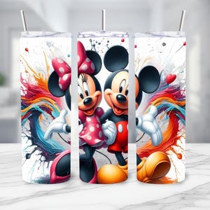 May include: Two colorful, personalized tumblers with a white background. The tumblers feature Mickey Mouse and Minnie Mouse in a colorful paint splatter design.