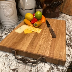 Beautiful 15x12 Hardwood Oak Cutting Board. Add Rustic Charm to your Kitchen with this Butcher Block Serving Board. Large and Spacious.
