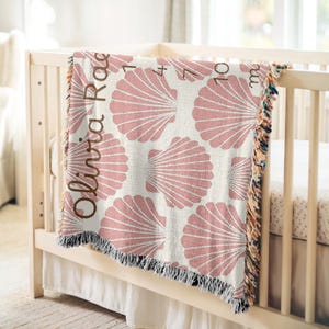 Pink seashell blanket, custom milestone blanket girls, beach milestone blanket, ocean milestone blanket, pink seashells nursery blanket, pink beach nursery decor, ocean milestone blanket, beach nursery decorations, ocean theme baby shower gift, beach baby shower gift, personal baby shower gift, girls milestone blanket, milestone blanket baby shower gift, baby girl name gift, personalized milestone blanket, custom milestone blanket girls, pink nursery decorations, ocean theme nursery decor