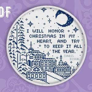 May include: A cross-stitch design in a white circular frame, featuring a winter village scene and the quote "I WILL HONOR CHRISTMAS IN MY HEART, AND TRY TO KEEP IT ALL THE YEAR." by Charles Dickens. The design is in shades of blue.