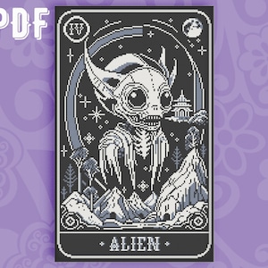 May include: A black and white cross-stitch pattern of an alien with large eyes and a pointed head. The alien is standing in front of a mountain range and a crescent moon. The text "ALIEN" is printed below the alien.
