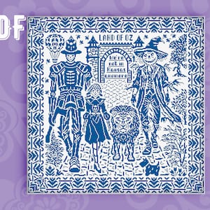 May include: Blue and white cross-stitch pattern featuring characters from the Wizard of Oz, including the Tin Man, Dorothy, the Scarecrow, the Cowardly Lion, and Toto. The text "LAND OF OZ" and "We're not in Kansas anymore" are included in the design.