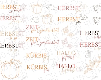 May include: A collection of rub-on stickers featuring autumn-themed illustrations and German text. Designs include pumpkins, hedgehogs, acorns, mushrooms, and leaves in shades of orange, brown, and pink, with phrases like Herbst Zauber.