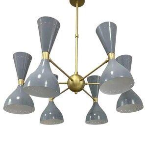 May include: A mid-century modern chandelier with eight gray cone-shaped shades. The fixture has a brass finish on the central sphere, arms, and the top. The shades are gray with a white interior and small perforations.