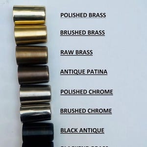 May include: An image displaying eight brass finishes: Polished Brass, Brushed Brass, Raw Brass, Antique Patina, Polished Chrome, Brushed Chrome, Black Antique, and Blackend Brass. Each finish is shown on a cylindrical metal piece.