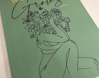 May include: Green journal with the words "What you water Grows" in yellow and black script. A line drawing of a person with flowers covering their head is on the cover. The word "Journal" is in the bottom right corner.