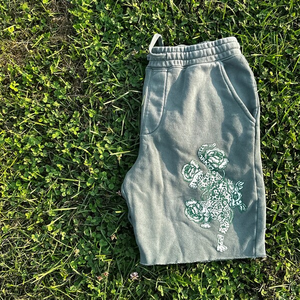 Green Jaguar Shorts: Empowerment, Sustainability & Mental Health Awareness