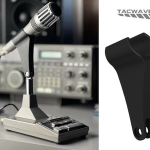 May include: A vintage silver and black microphone with a stand, positioned in front of a radio receiver. The microphone has a mesh head and is connected by a wire. A black bracket is also shown, with the text "TACWAVE" above it.
