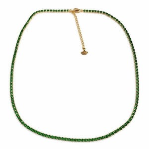 May include: A gold-tone tennis necklace featuring a continuous row of small, round, vibrant green stones. The necklace includes a gold-tone metal chain extender with a small, triangular-shaped charm at the end, providing an adjustable fit.