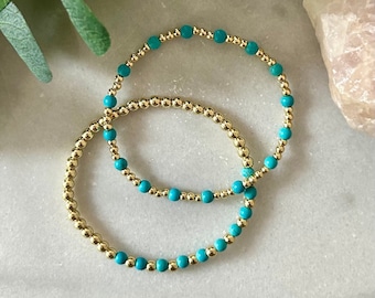 Hammered Disk Curff Bracelet with Reconstituted Turquoise 14k gold-plated Hammered Disk Curff Bracelet with Reconstituted Turquoise 14k gold-plated