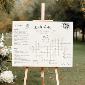 May include: A white printable wedding sign with a crossword puzzle and the text "Sip & Solve Jessica & Oliver 09.10.2030".