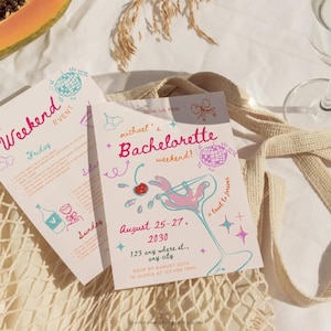 May include: A pink and blue bachelorette party invitation with a martini glass, a cherry, and the text "Join us for Michael's Bachelorette Weekend!"  August 25-27, 2030. 123 any where st., any city. RSVP by August 20th to Olivia at 123 456 7890. @amorweddingtemplates