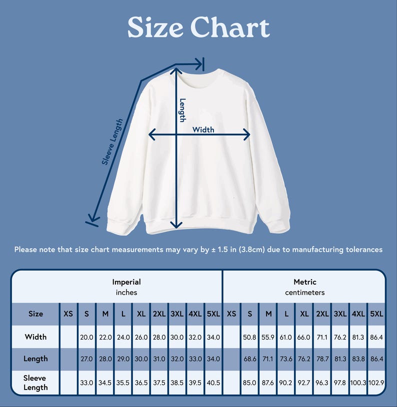 Peut inclure: Un sweat-shirt blanc avec un tableau des tailles. Le tableau indique les mesures en pouces et en centim&egrave;tres pour la largeur, la longueur et la longueur des manches, de XS &agrave; 5XL. Le texte "Size Chart" est en haut.