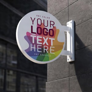 White double sided round hanging business sign mounted on exterior wall with custom logo, modern storefront blade sign