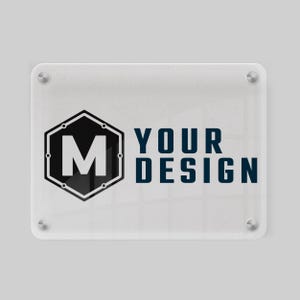 May include: A clear glass sign with rounded corners and silver screws. The sign has a black and white geometric logo with the letter "M" in the center. The text "YOUR DESIGN" is printed in dark blue below the logo.