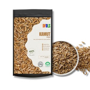 May include: A black packet of Kamut grain, branded "DFOLS", with the word "KAMUT" prominently displayed. A white bowl filled with Kamut grains is beside the packet. The packet states "100% Natural" and "Organic Farm".