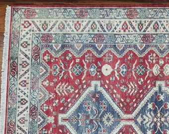 This Rectangular Beautiful Geometric Shiraz Design  Size: 5' 11"  X  9' 0" is  Hand made & Hand Knotted Wool Red Background