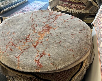 A Modern round 4' 1"  Beige multicolored silver orange area rug. hand made hand Knotted Combination of Cotton, Wool & Bamboo Silk